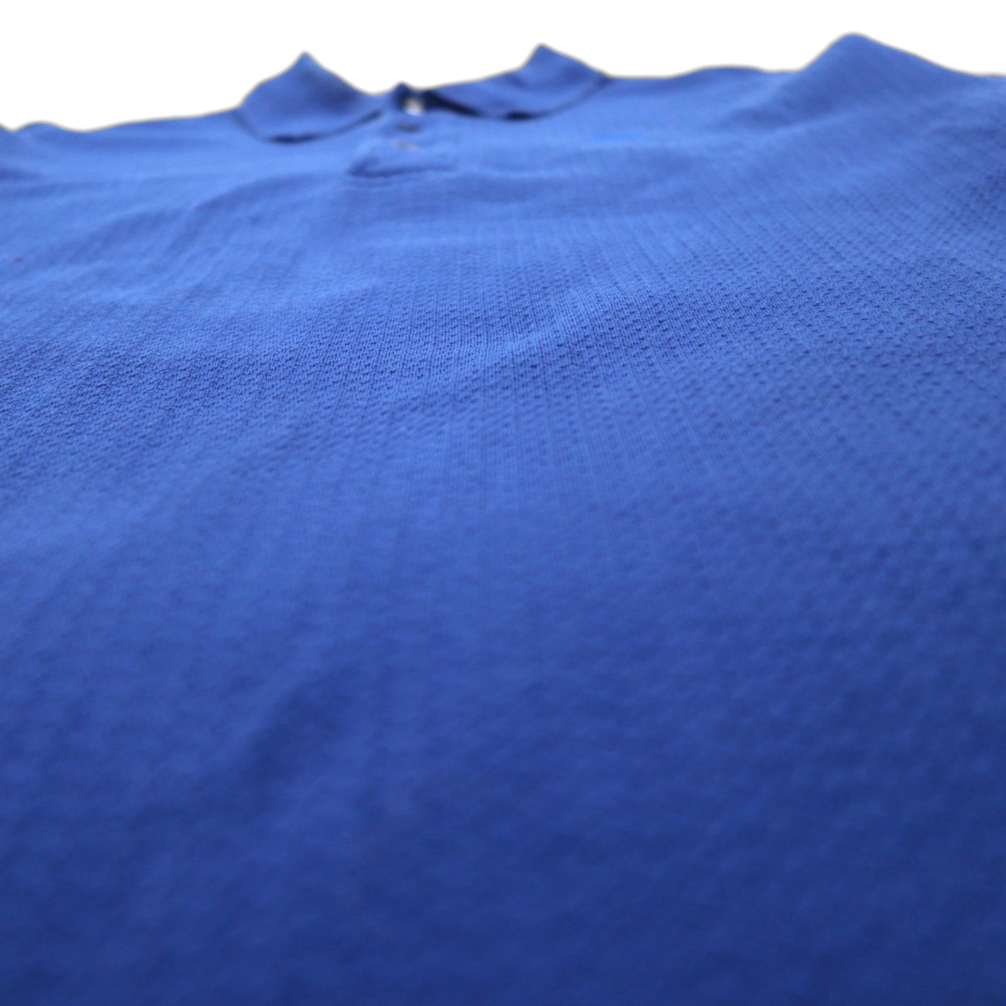 Burberry's USA-made jacquard polo shirt, size M, blue cotton, with one-point logo embroidery.