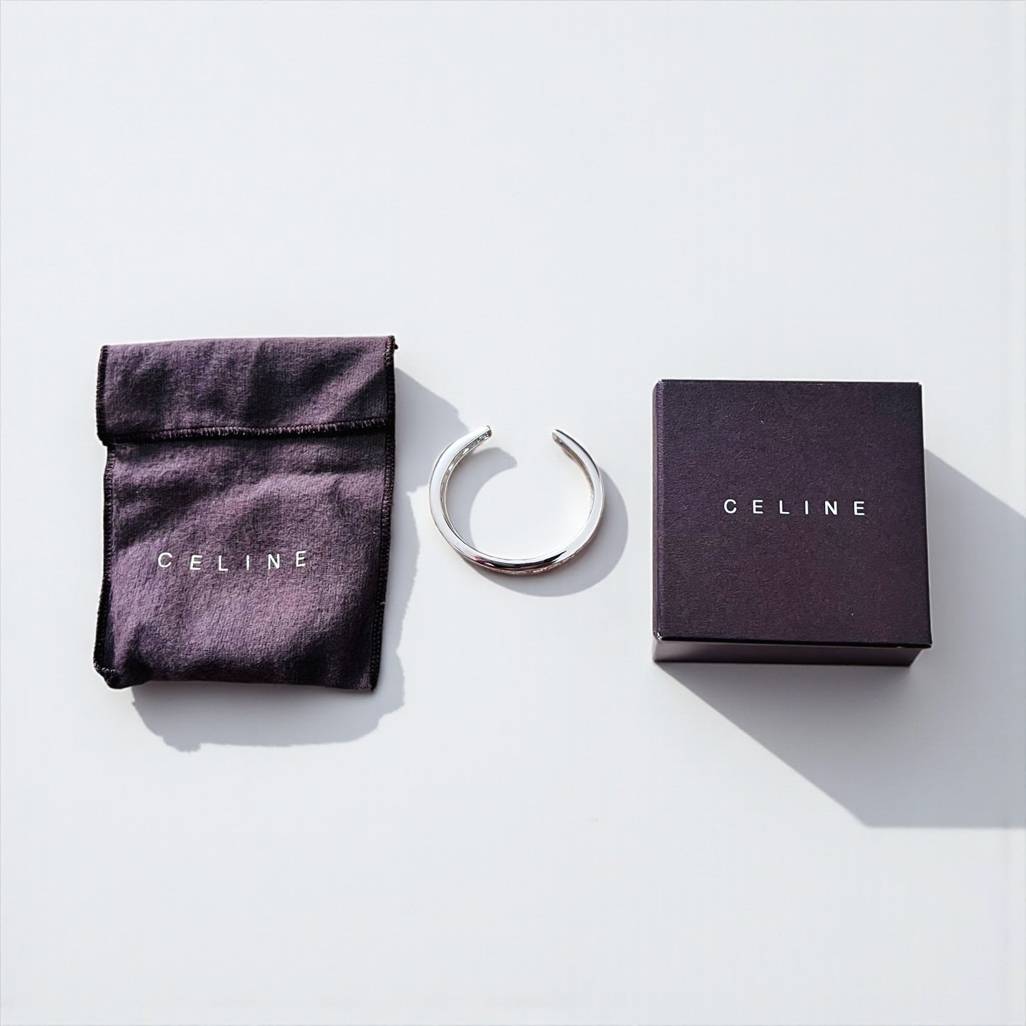 CELINE バングル カフ ブレスレット シルバー メタル カットアウトロゴ 透かし