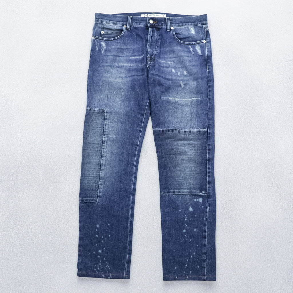 Alexander McQueen Italian-made distressed denim jeans, size L, blue, skinny fit.