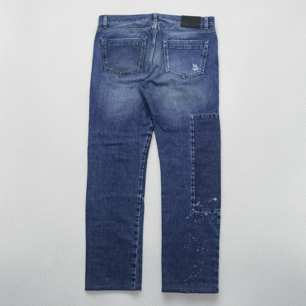 Alexander McQueen Italian-made distressed denim jeans, size L, blue, skinny fit.