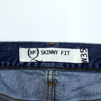 Alexander McQueen Italian-made distressed denim jeans, size L, blue, skinny fit.