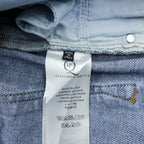 Alexander McQueen Italian-made distressed denim jeans, size L, blue, skinny fit.