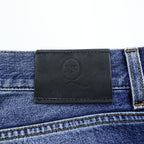 Alexander McQueen Italian-made distressed denim jeans, size L, blue, skinny fit.