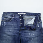 Alexander McQueen Italian-made distressed denim jeans, size L, blue, skinny fit.