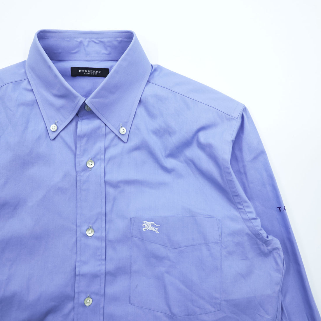 BURBERRY button-down shirt, size M, blue, with a single logo accent.
