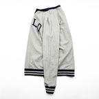 Polo Ralph Lauren V-gusset sweatshirt, size L, beige/navy, with arch logo patch and ribbed trim.