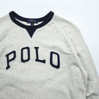 Polo Ralph Lauren V-gusset sweatshirt, size L, beige/navy, with arch logo patch and ribbed trim.