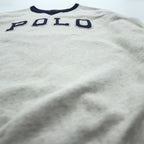 Polo Ralph Lauren V-gusset sweatshirt, size L, beige/navy, with arch logo patch and ribbed trim.