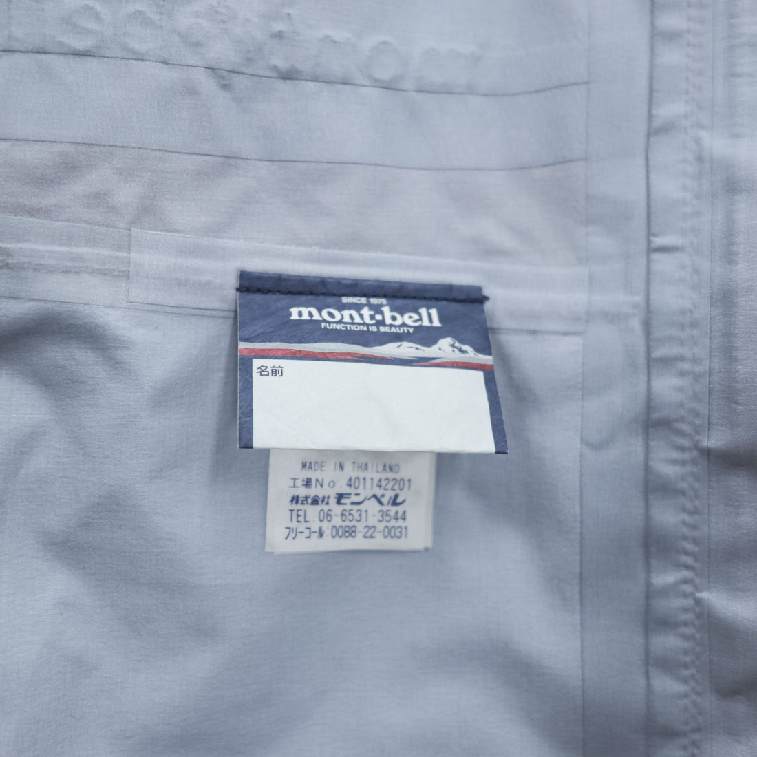 mont-bell ゴアテックス GORE-TEX 防水 マウンテンパーカー シェル レインジャケット L オレンジ ストームクルーザー ドローコード フード収納 1128256