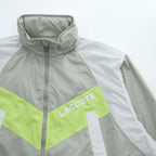 LACOSTE SPORT カラーブロック フーデッド ウインドブレーカー XL イエロー グレー メッシュ ドローコード フード収納式 BF1567 未使用品