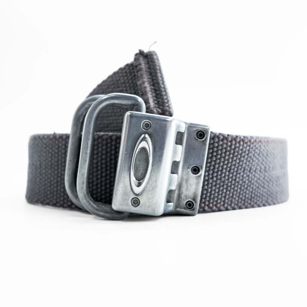 OAKLEY ウェビングベルト シルバー メタルバックル ダブルリング グレー ナイロン キャンバス