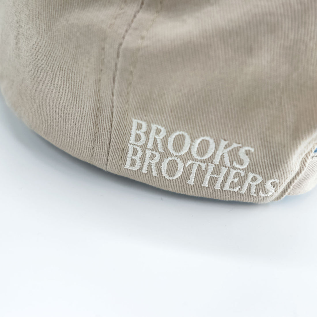 Brooks Brothers cap, beige, with a single logo accent.