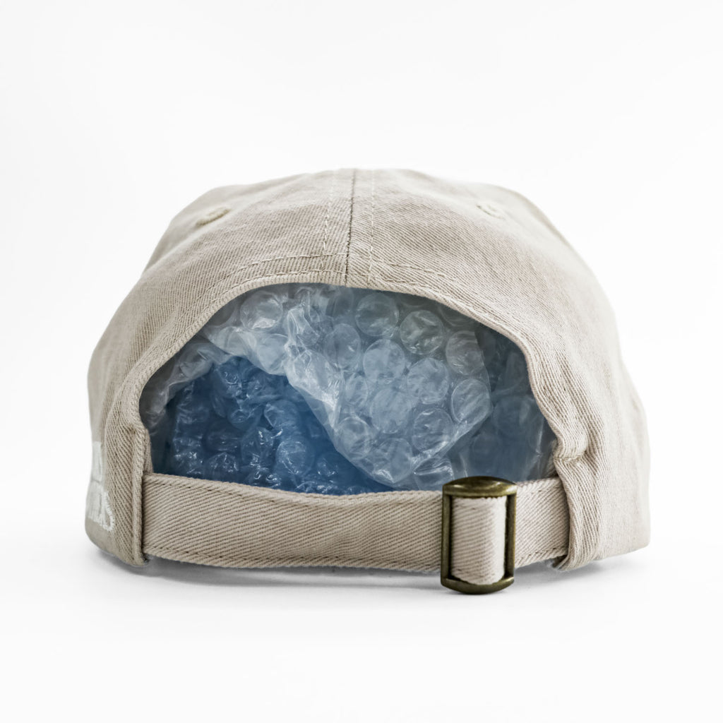 Brooks Brothers cap, beige, with a single logo accent.