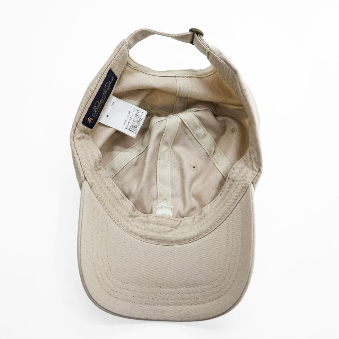 Brooks Brothers cap, beige, with a single logo accent.