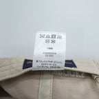 Brooks Brothers cap, beige, with a single logo accent.