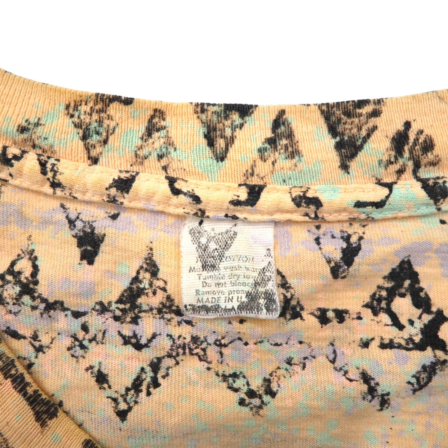 '90s USA-made Yaga Rugz' single-stitch vintage T-shirt, size 2XL, pink, all-over Native American print