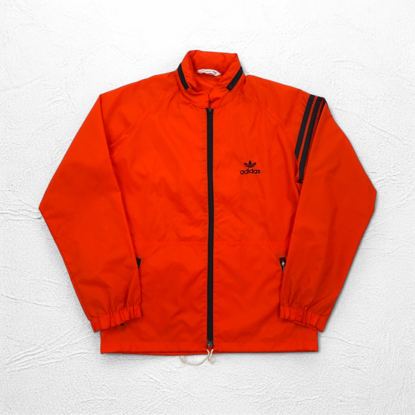 adidas 90年代 デサント社製 ナイロンジャケット ジャージ M オレンジ トレフォイルロゴ刺繍 フード収納式