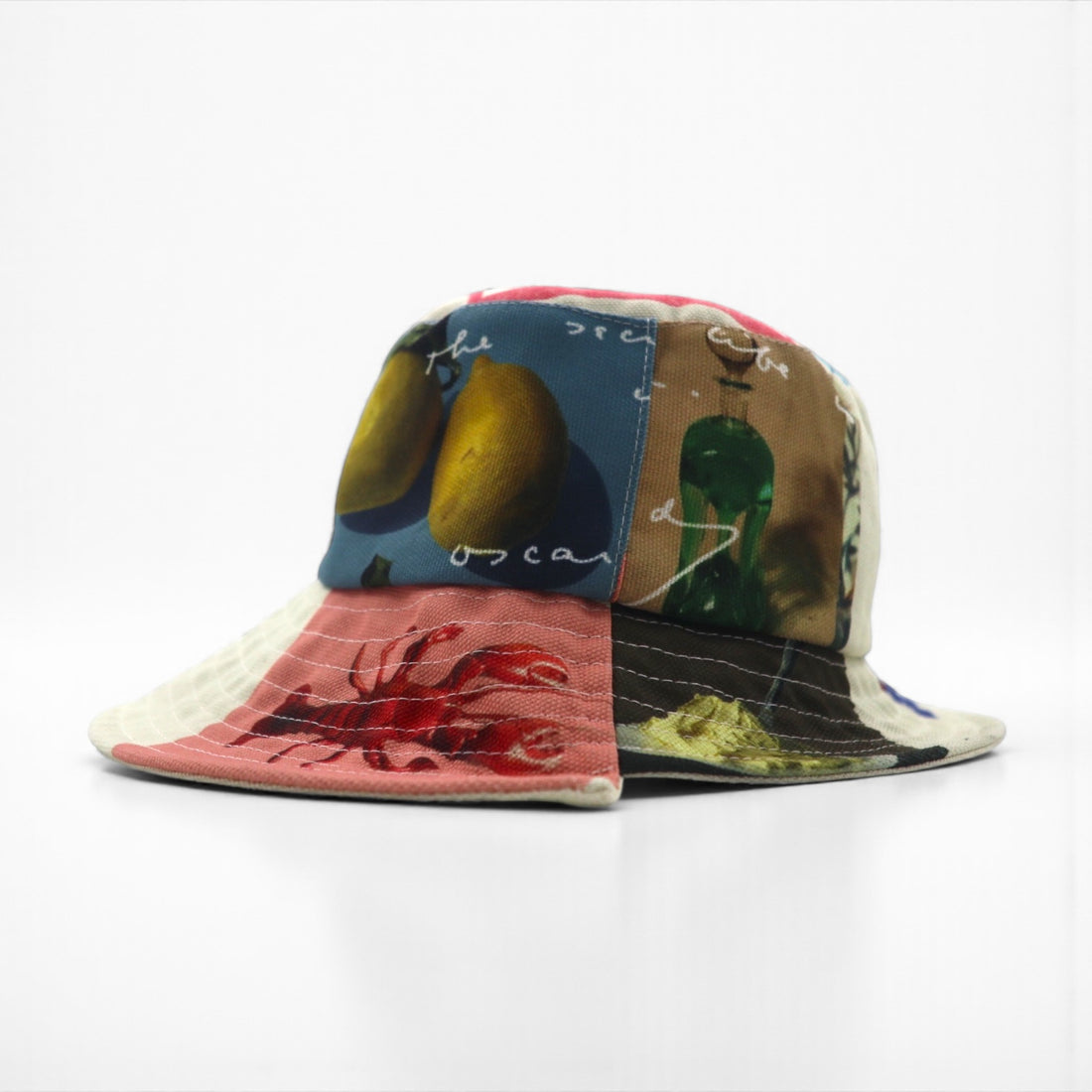 J.W.ANDERSON アシンメトリー バケットハット Asymmetric Bucket Hat マルチカラー 総柄 ロゴテープ ストラップ AC0177FA0153019