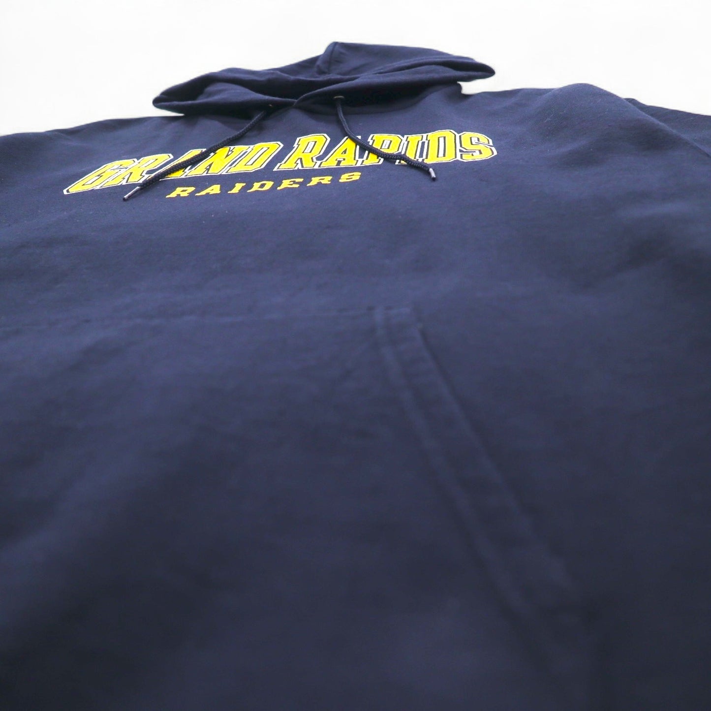 Champion プルオーバー パーカー 3XL ネイビー ビッグサイズ GRAND RAPIDS RAIDERS エルサルバドル製