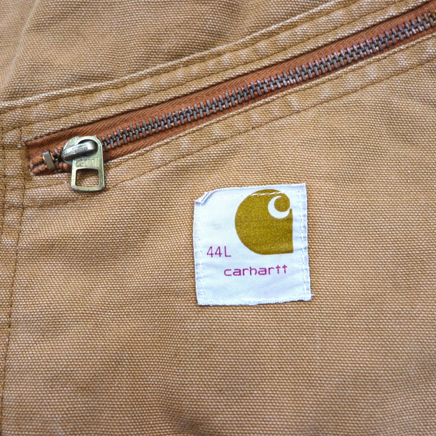 Carhartt 1970s USA-made duck padded jumpsuit, size L, camel, with quilted liner and gripper zipper. Item number 996QZ.