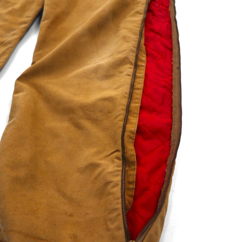 Carhartt 1970s USA-made duck padded jumpsuit, size L, camel, with quilted liner and gripper zipper. Item number 996QZ.