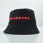 Prada technical fabric bucket hat in black Linea Rossa Sport, made in Italy