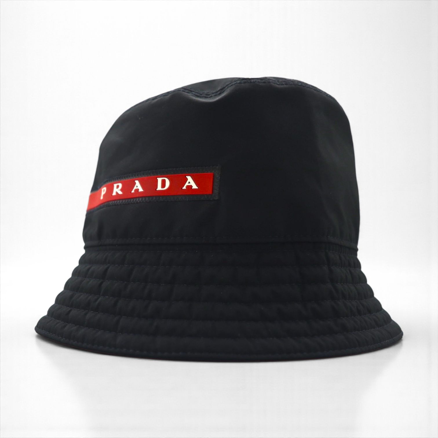 Prada technical fabric bucket hat in black Linea Rossa Sport, made in Italy