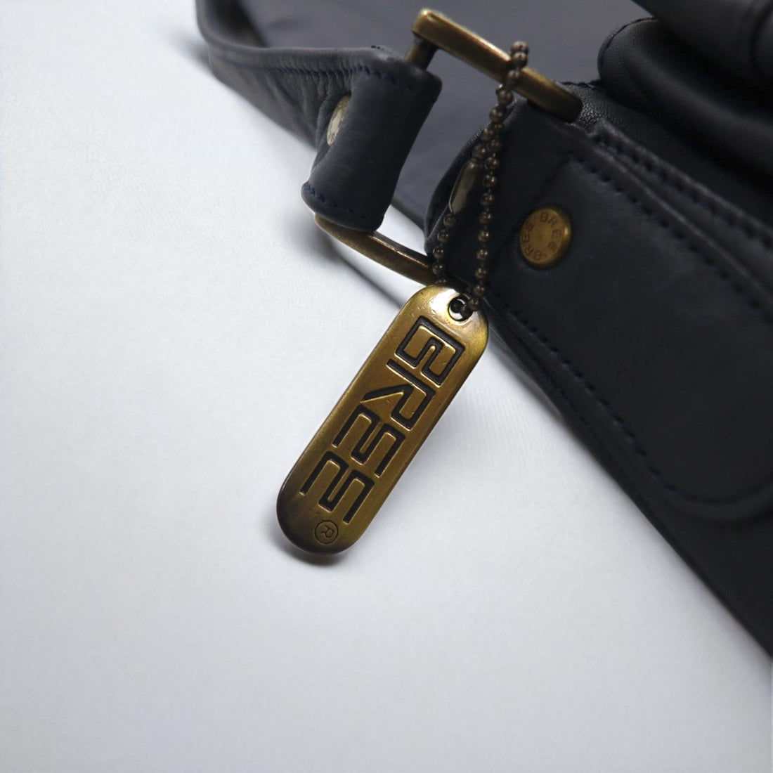BREE cross shoulder bag in navy smooth leather with flap