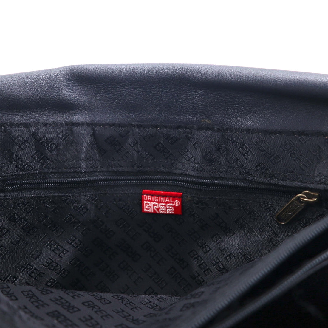 BREE cross shoulder bag in navy smooth leather with flap