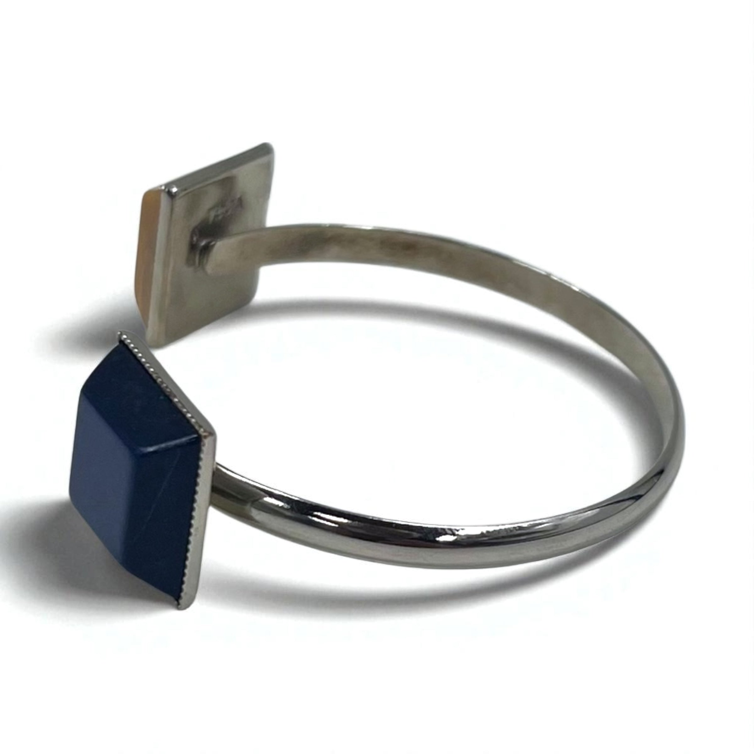 TOGA Color Stone Bangle Cuff Bracelet in Silver Metal with Square Shape and Blue Amber