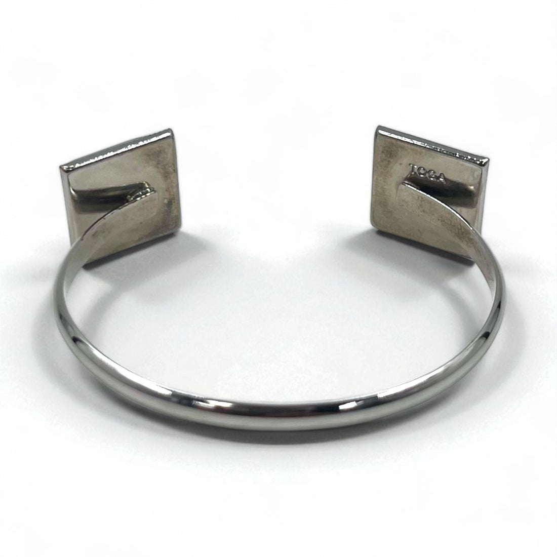 TOGA Color Stone Bangle Cuff Bracelet in Silver Metal with Square Shape and Blue Amber