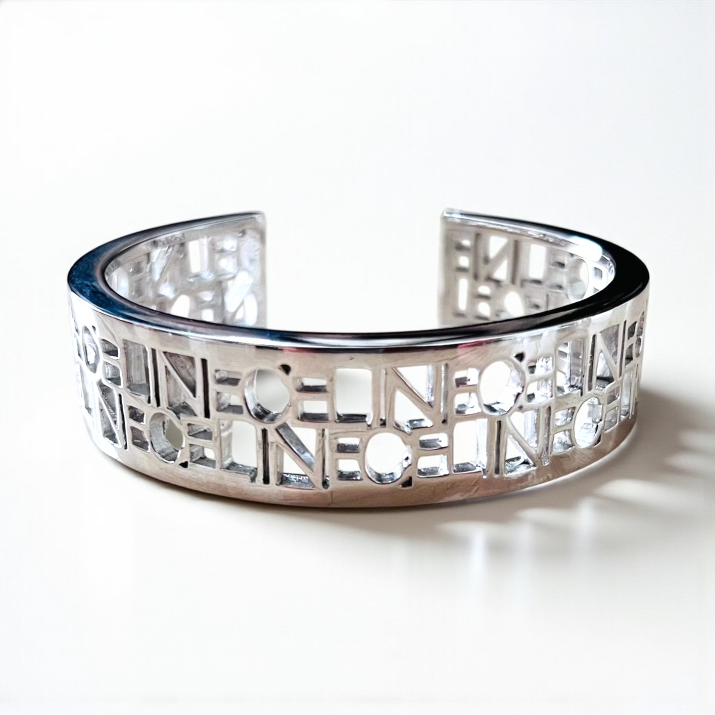 CELINE バングル カフ ブレスレット シルバー メタル カットアウトロゴ 透かし