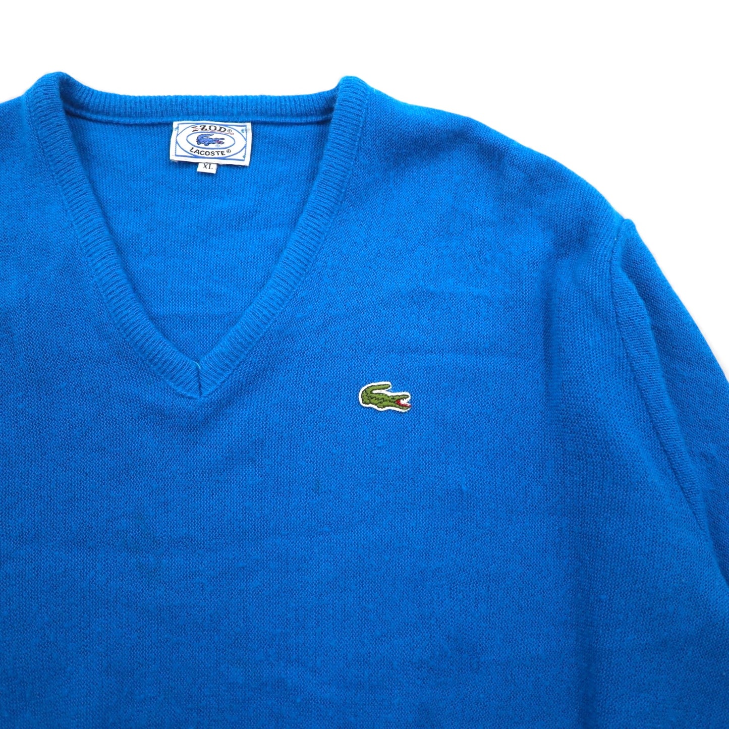 Vintage 70s Lacoste V-neck acrylic knit sweater, size XL, blue, with spool tag.