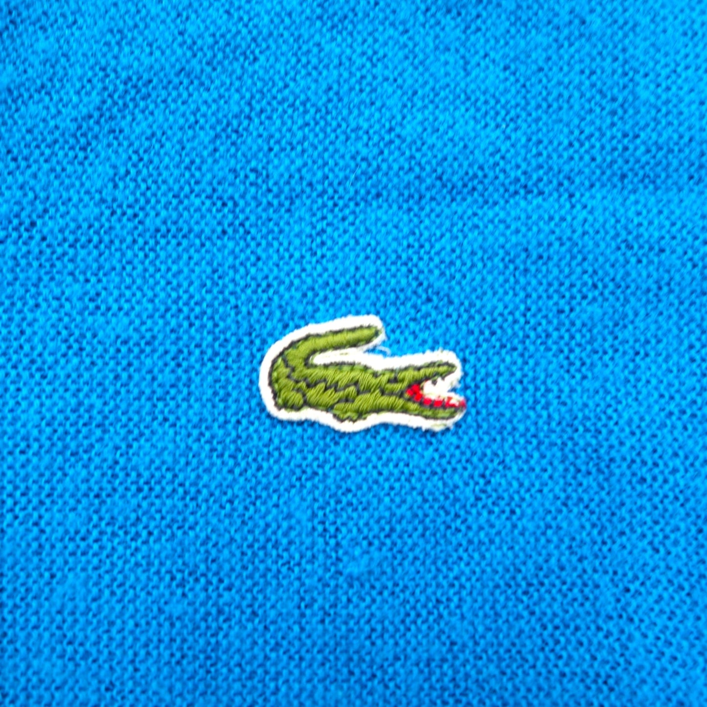 Vintage 70s Lacoste V-neck acrylic knit sweater, size XL, blue, with spool tag.