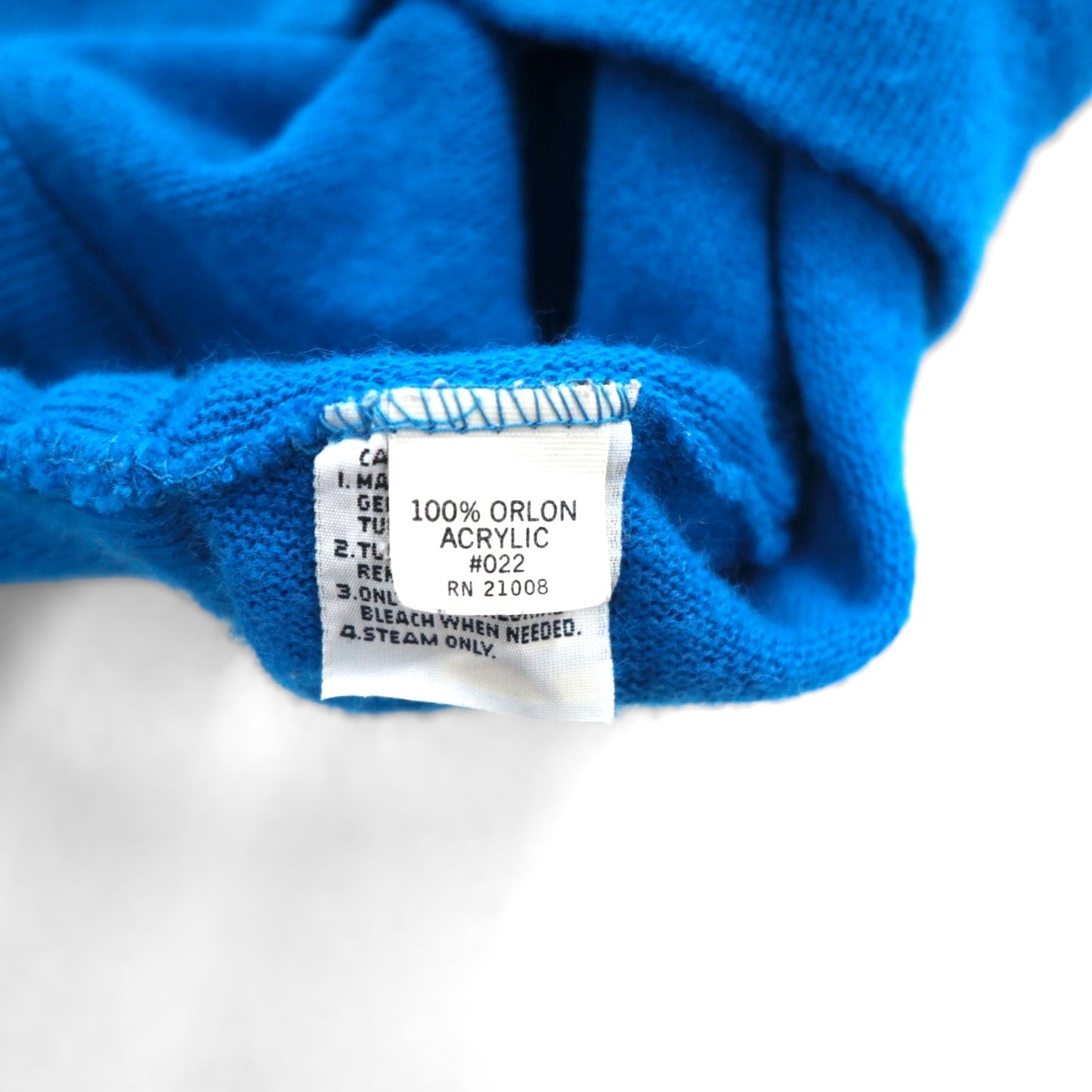 Vintage 70s Lacoste V-neck acrylic knit sweater, size XL, blue, with spool tag.