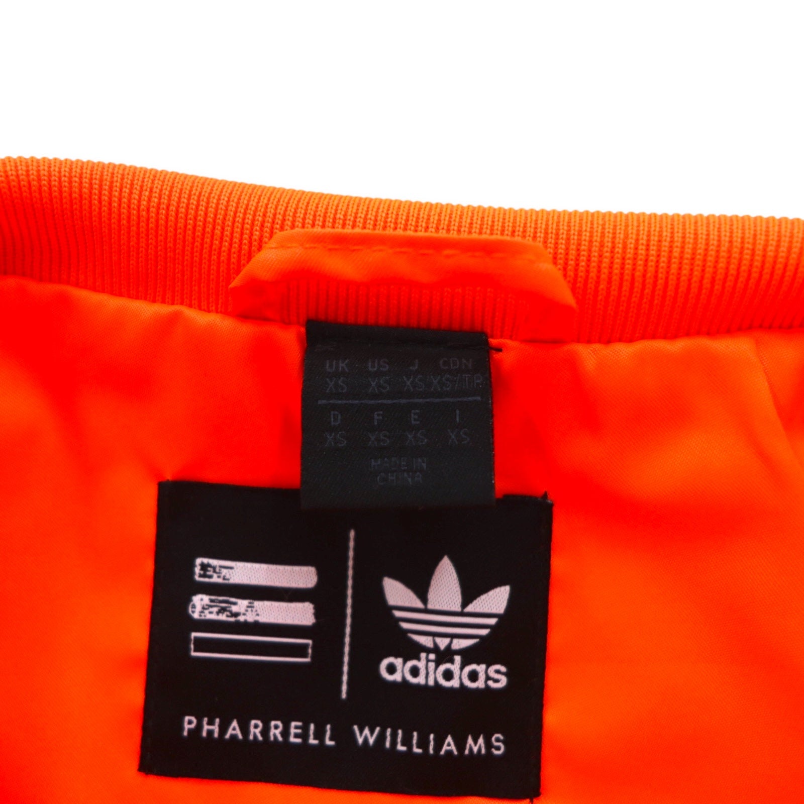 adidas originals × PHARRELL WILLIAMS トラックジャケット ジャージ XS オレンジ スナップボタン トレフォイルロゴ 3ストライプ Z97399