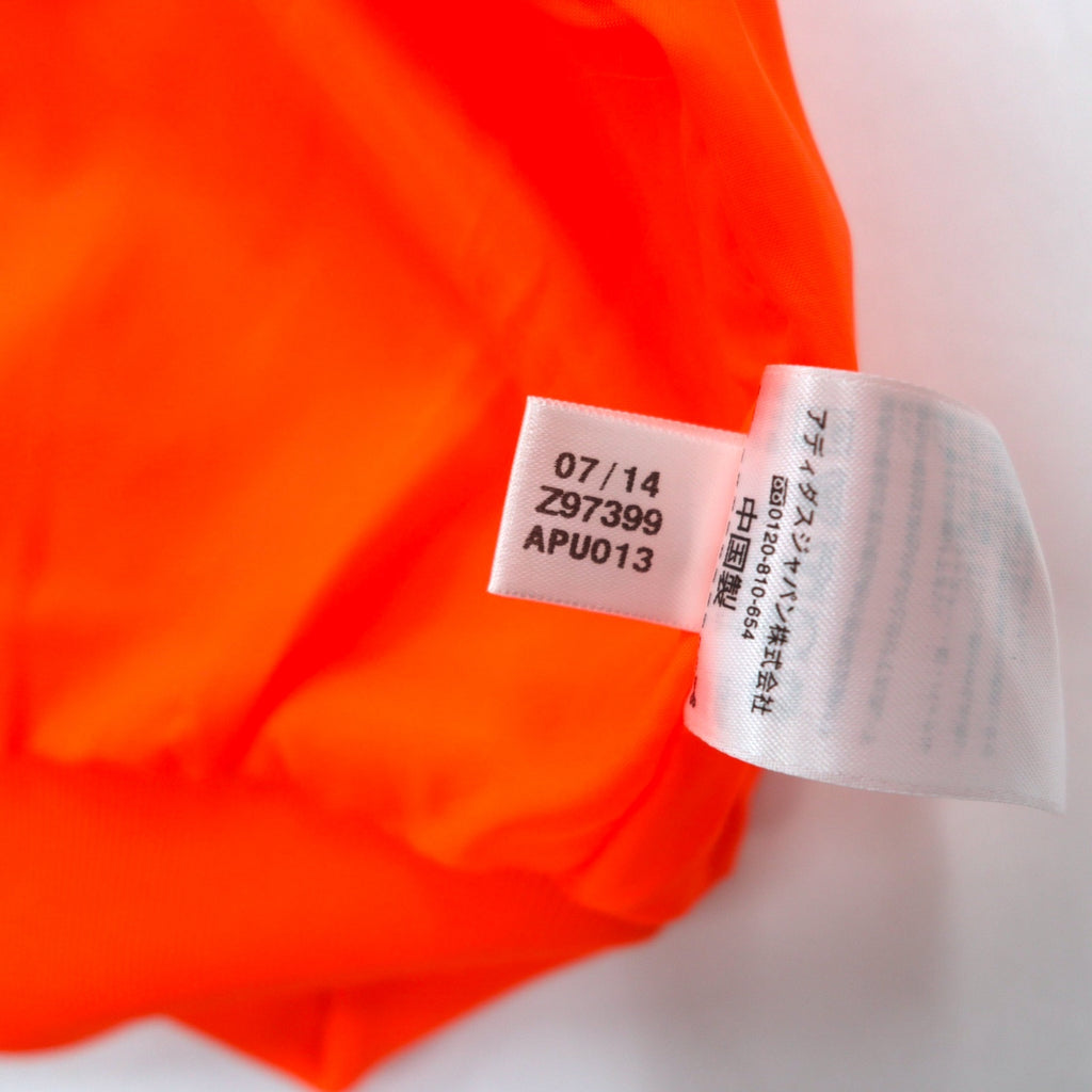 adidas originals × PHARRELL WILLIAMS トラックジャケット ジャージ XS オレンジ スナップボタン トレフォイルロゴ 3ストライプ Z97399