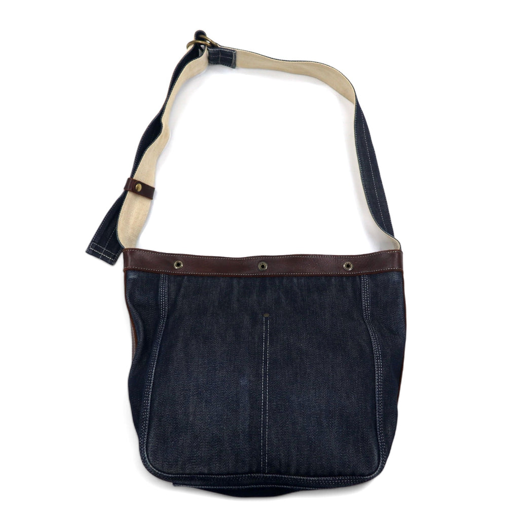 SLOW denim shoulder bag in blue with leather inserts and canvas