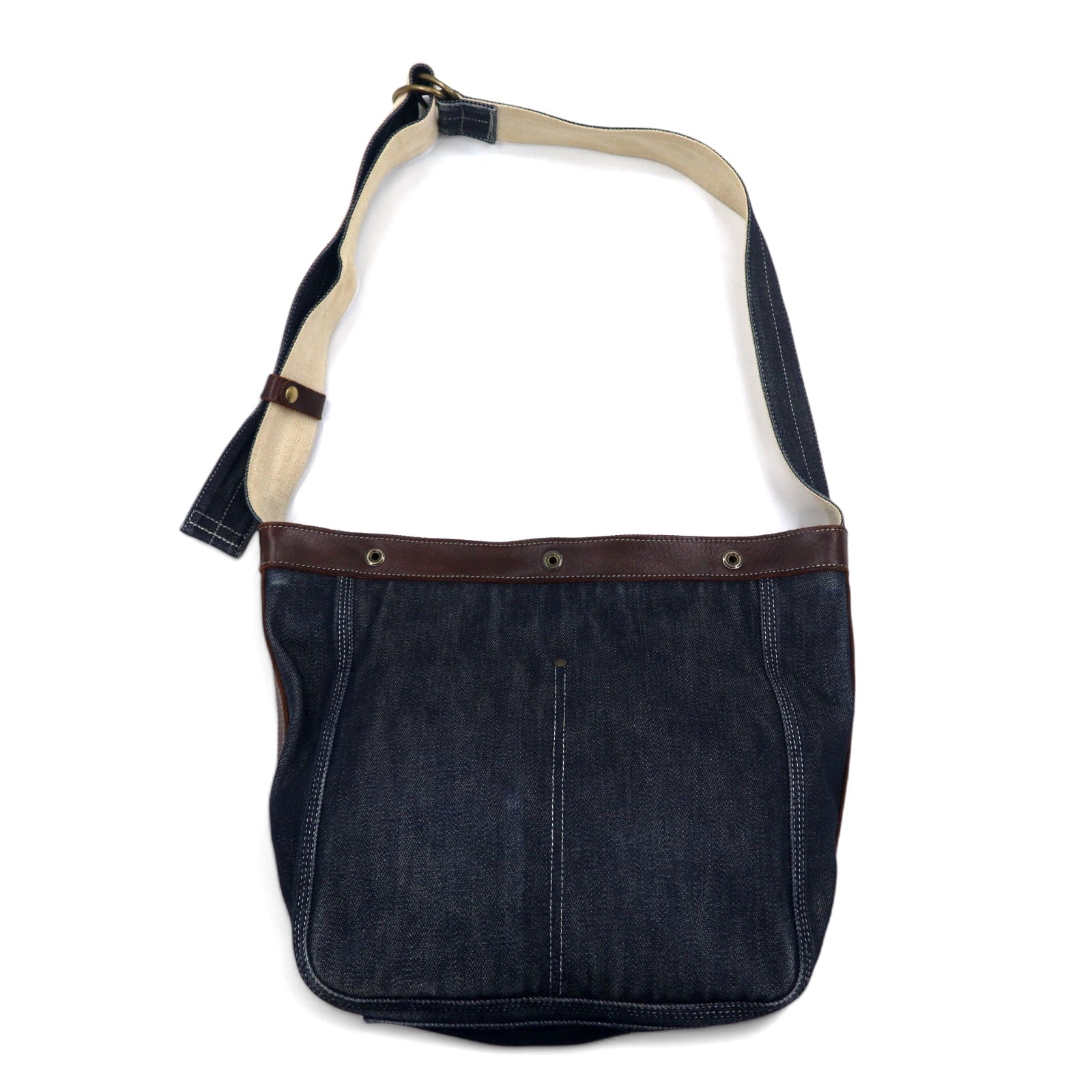 SLOW denim shoulder bag in blue with leather inserts and canvas