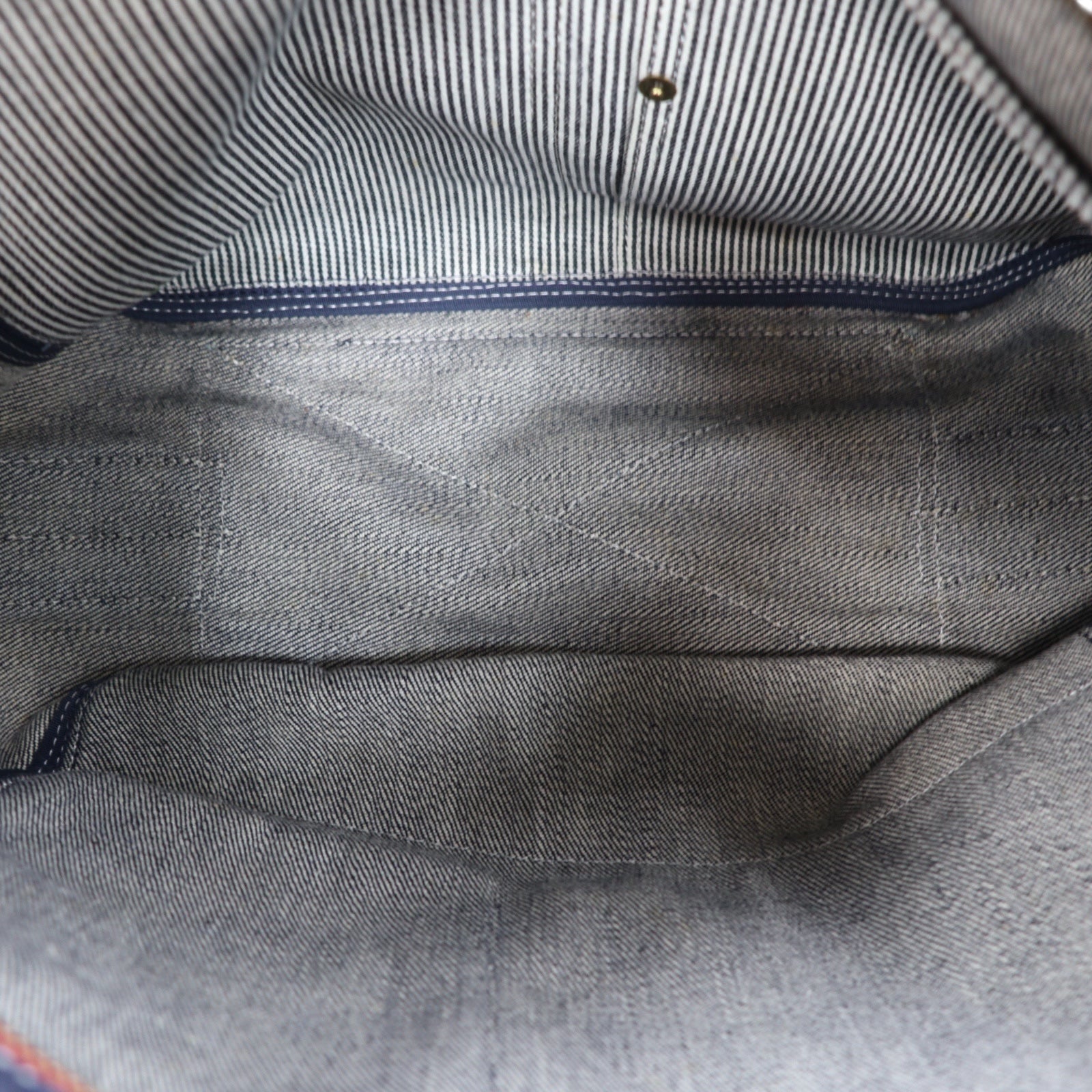 SLOW denim shoulder bag in blue with leather inserts and canvas