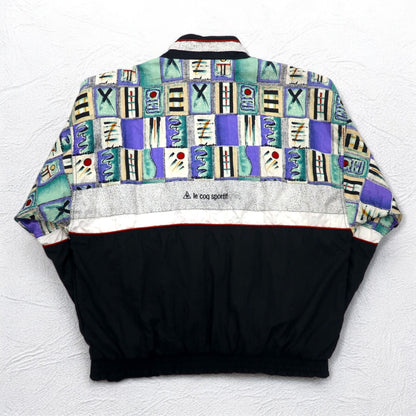le coq sportif 90年代 総柄 ナイロンジャケット ジャージ L マルチカラー ブラック