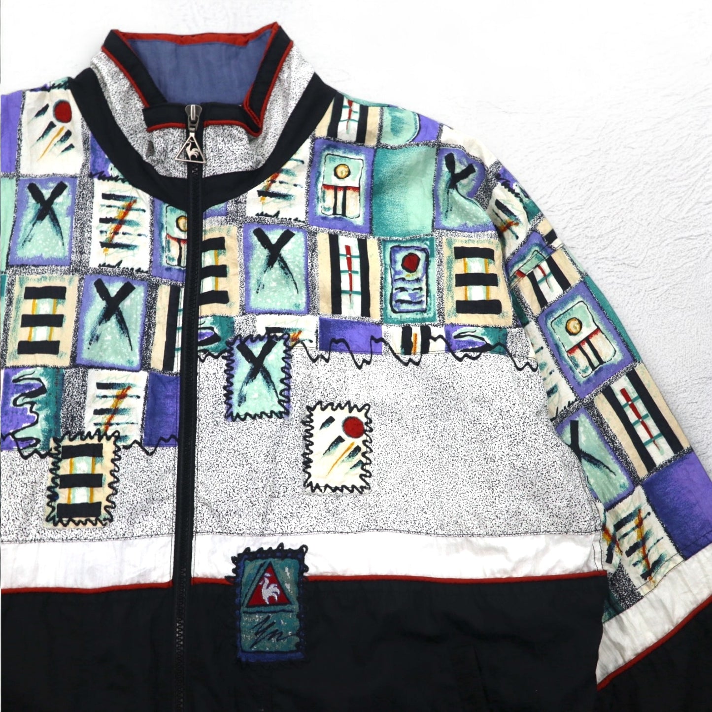 le coq sportif 90年代 総柄 ナイロンジャケット ジャージ L マルチカラー ブラック