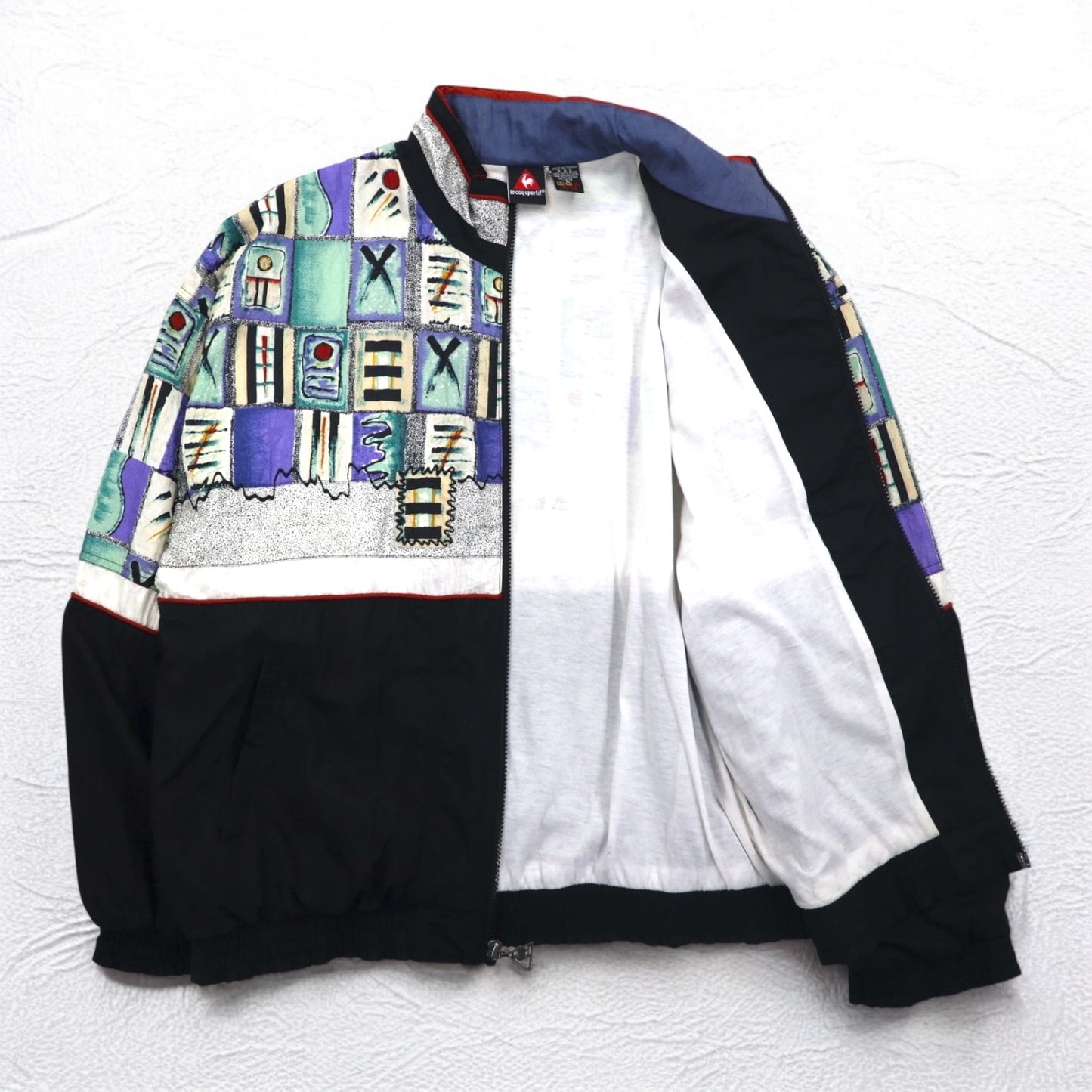 le coq sportif 90年代 総柄 ナイロンジャケット ジャージ L マルチカラー ブラック