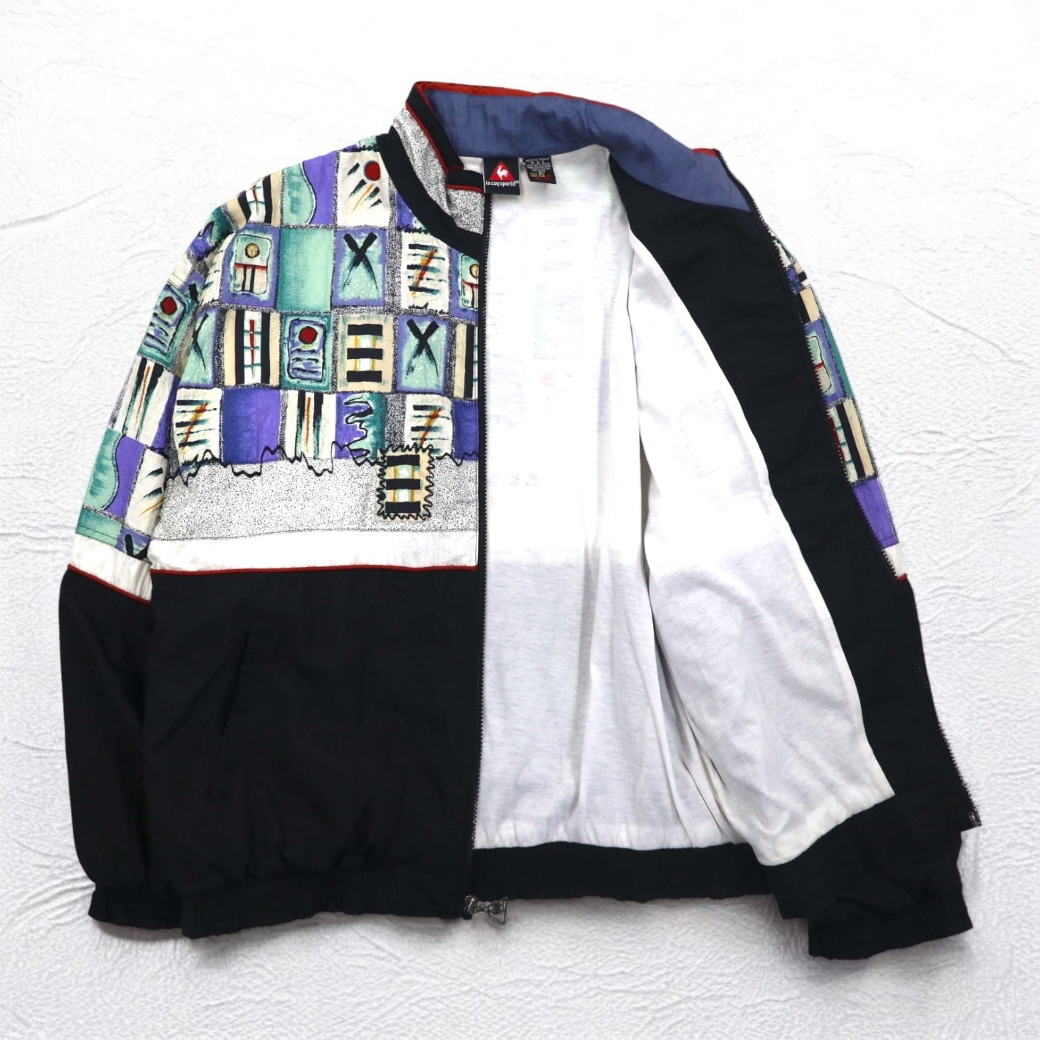 le coq sportif 90年代 総柄 ナイロンジャケット ジャージ L マルチカラー ブラック
