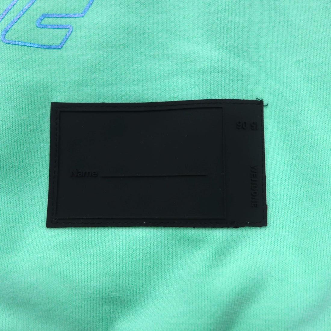 WE11DONE Pullover Hoodie S Mint Green Logo Print Iridescent Logo Hoodie
